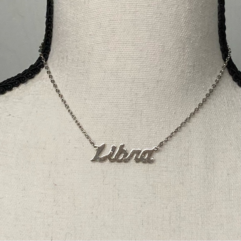 EUC Vintage silver tone metal Libra necklace.